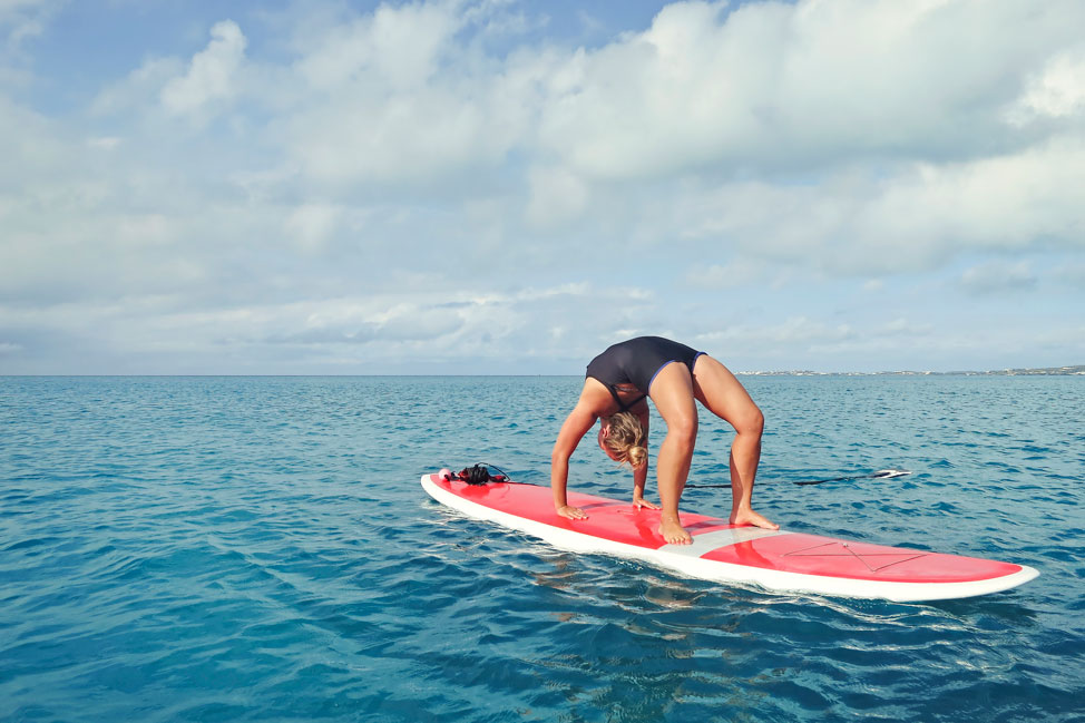 Paddleboarding yoga