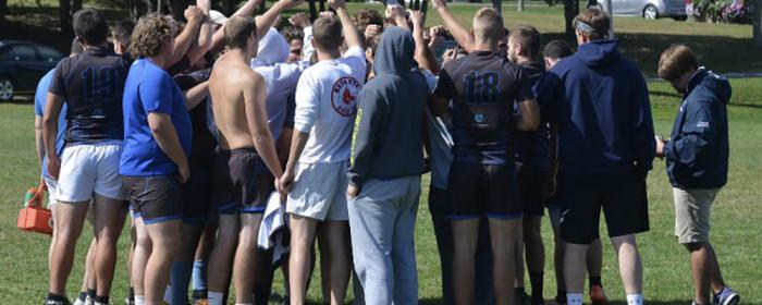 team high five at practice end