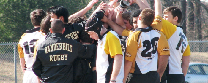 team gathers for a cheer before the match