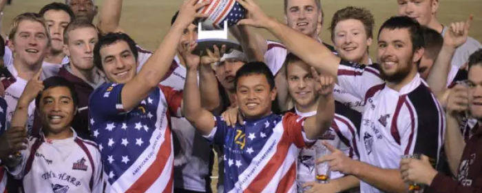 University of Massachusetts team celebrates after victory at URugby Bowl Series