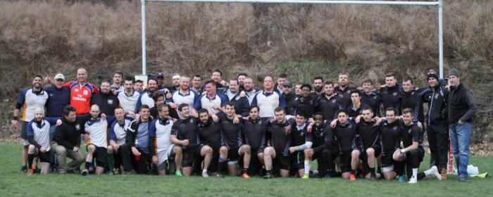 Western Connecticut players gathered on the field for a team photo