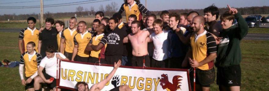 Ursinus College Rugby team with banner