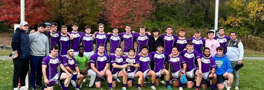team with banner of Univ of Scrantion in purple