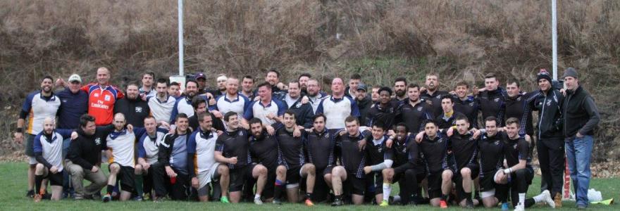 Western Connecticut players gathered on the field for a team photo