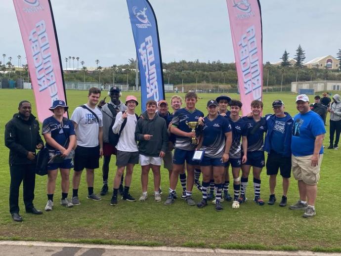team accepts championship trophy