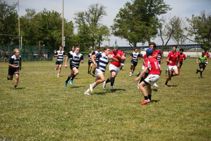 rugby ball carrier on the move