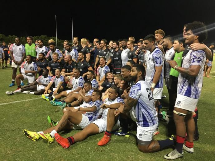 USA Islanders Team Photo Players gathered on the rugby field for a photo